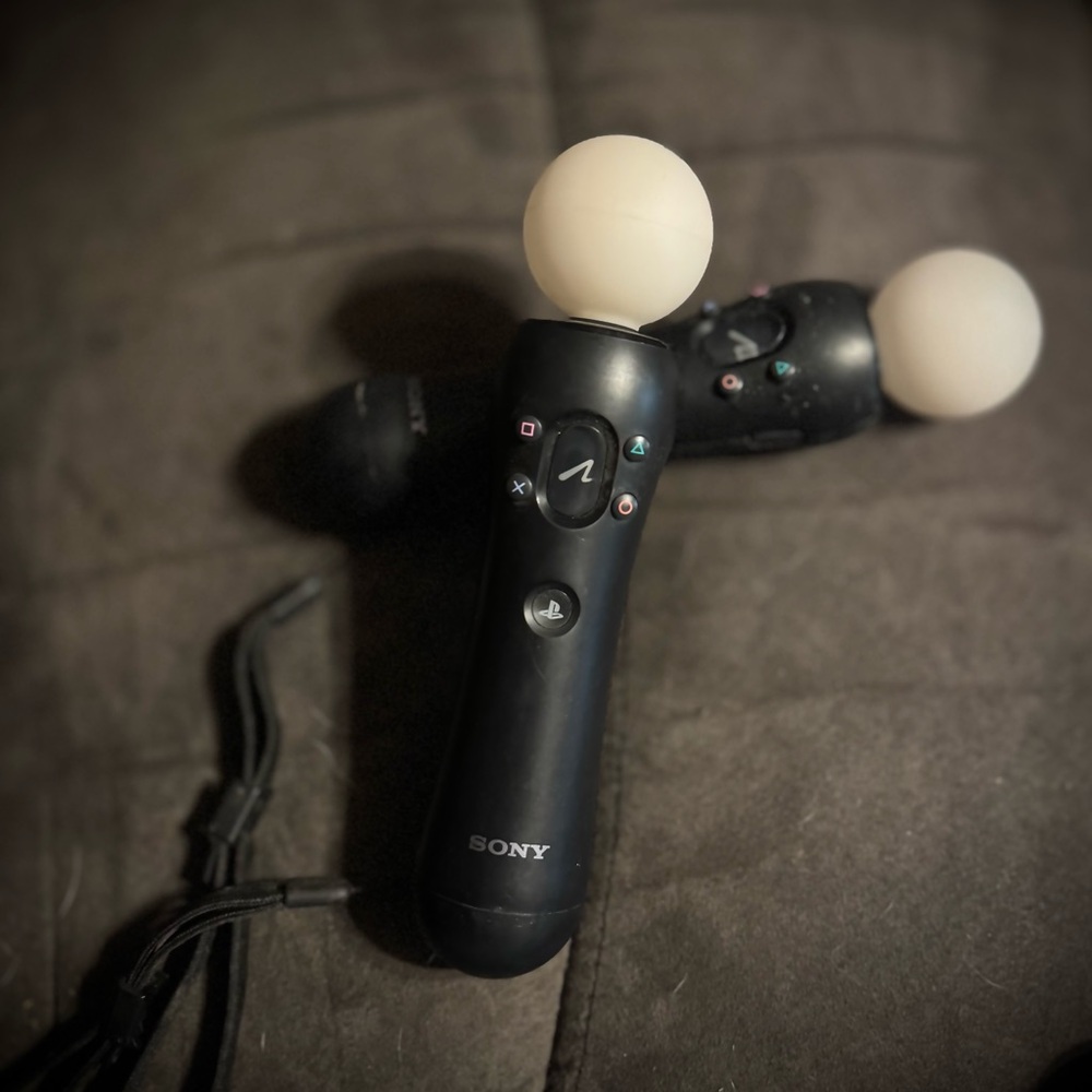 Sony Motion Controllers with Black and White Design